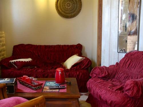 Posezení v ubytování Les Chambres de Pontfol - Chambres d'hôtes - Guest house