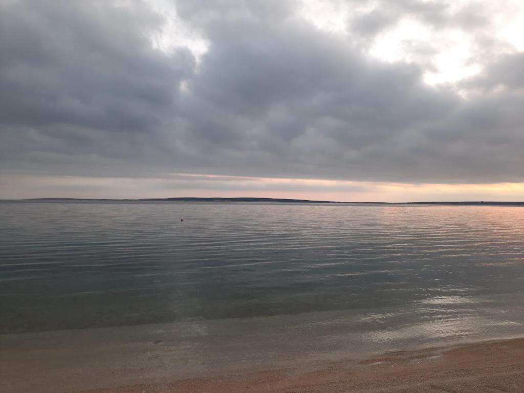 a view of a large body of water at Stara Kuća Apartments in Šimuni