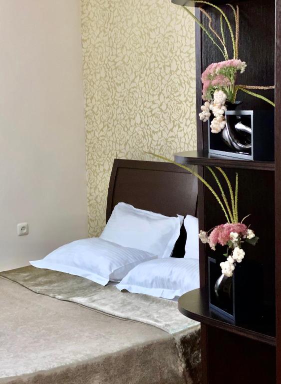 Postel nebo postele na pokoji v ubytování Parvana Hotel