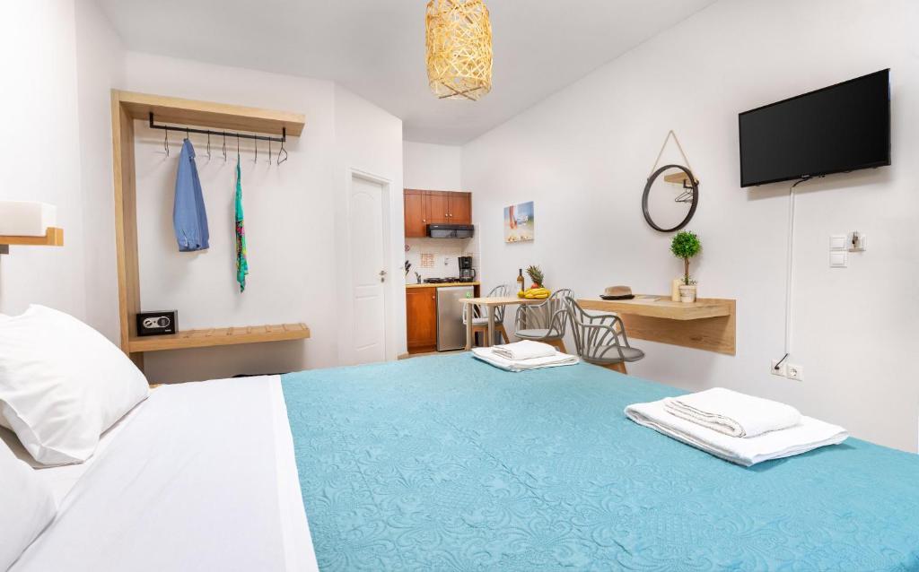 Postel nebo postele na pokoji v ubytování Sun Beach Apartments