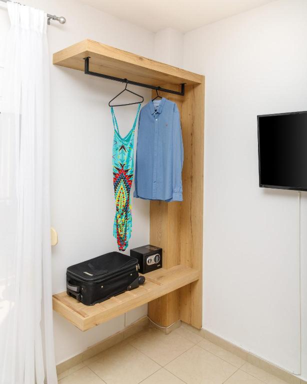 TV a/nebo společenská místnost v ubytování Sun Beach Apartments