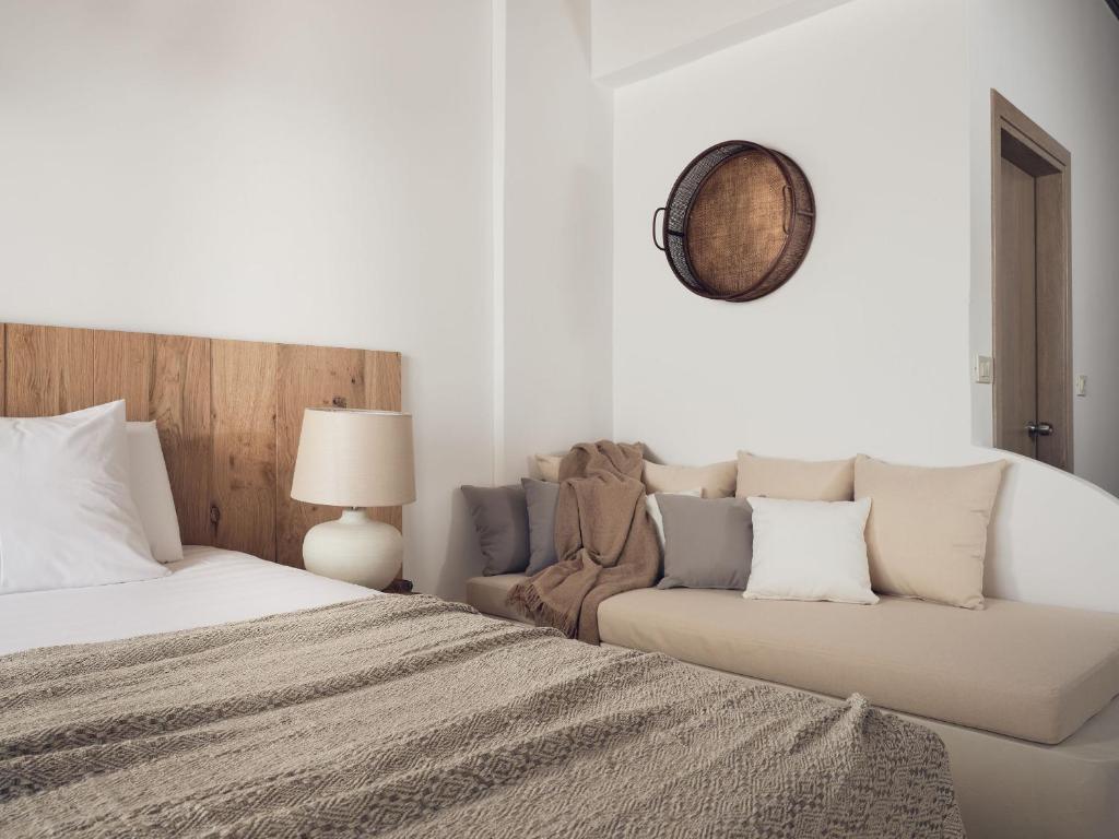 Postel nebo postele na pokoji v ubytování Shellona Rooms & Apartments
