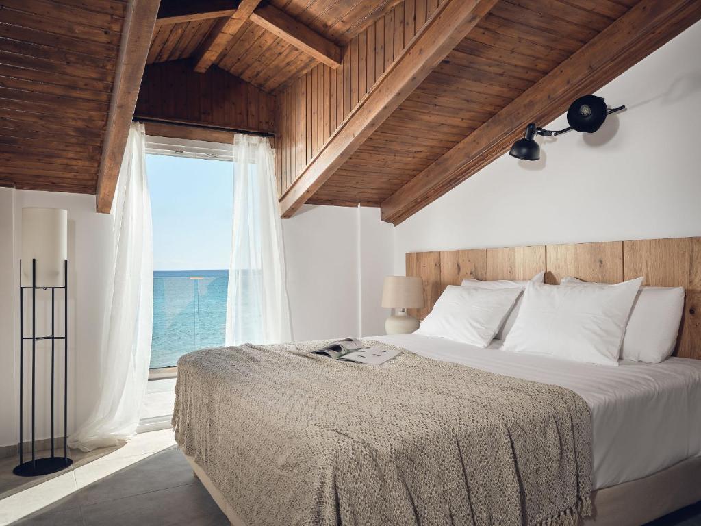 Postel nebo postele na pokoji v ubytování Shellona Rooms & Apartments