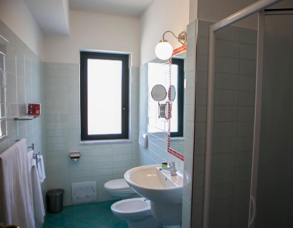 Koupelna v ubytování Hotel Miramare
