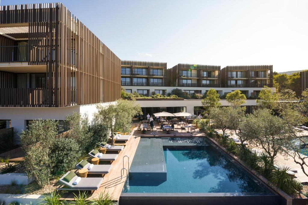an overhead view of a hotel with a swimming pool at Maslina Resort in Stari Grad