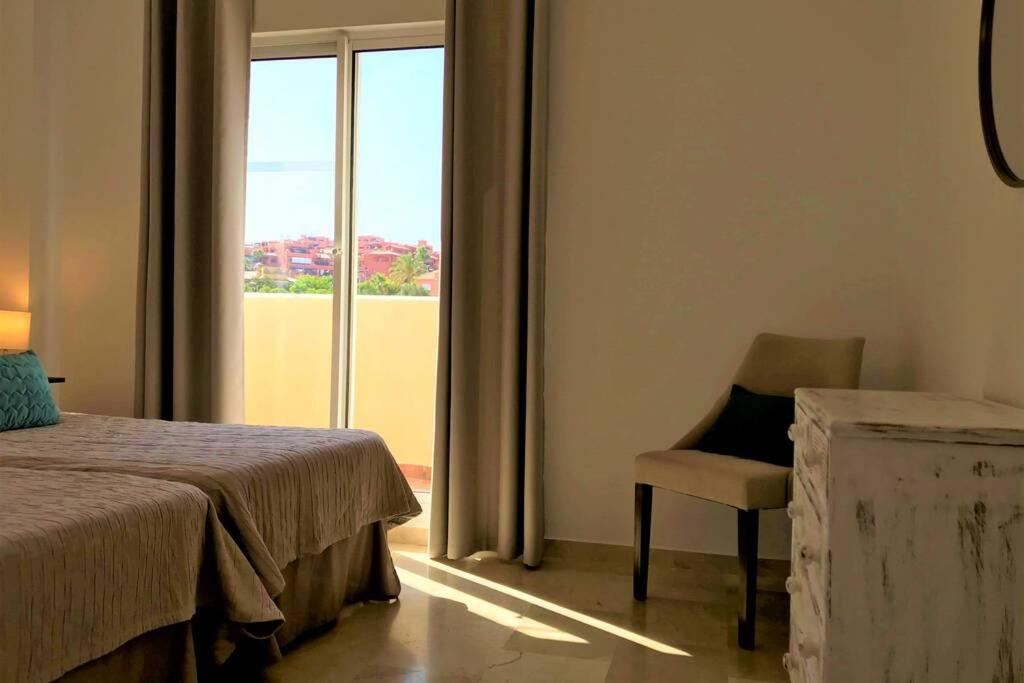 Posteľ alebo postele v izbe v ubytovaní PENTHOUSE BERMUDA BEACH 2