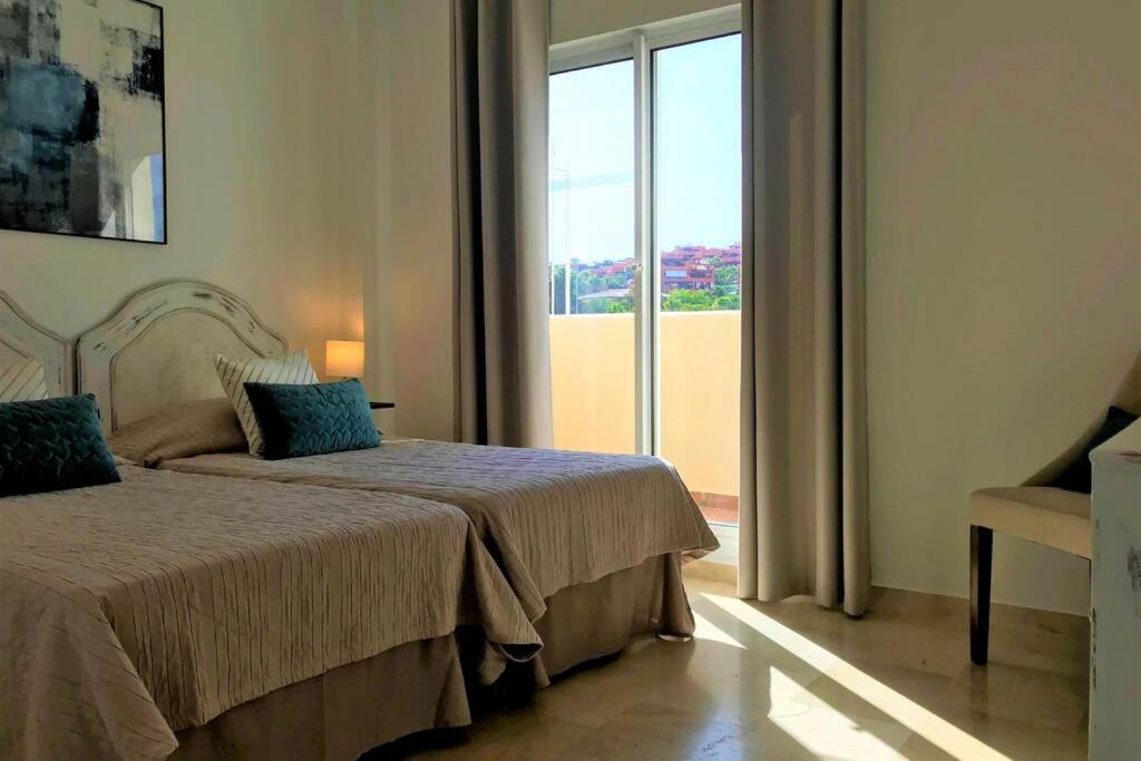 Posteľ alebo postele v izbe v ubytovaní PENTHOUSE BERMUDA BEACH 2