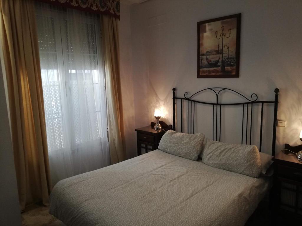 Postel nebo postele na pokoji v ubytování Patio de la Fuenseca