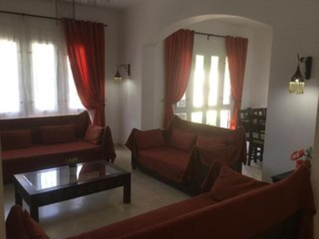 A seating area at Extremely Private Villa with Optional Pool Heating