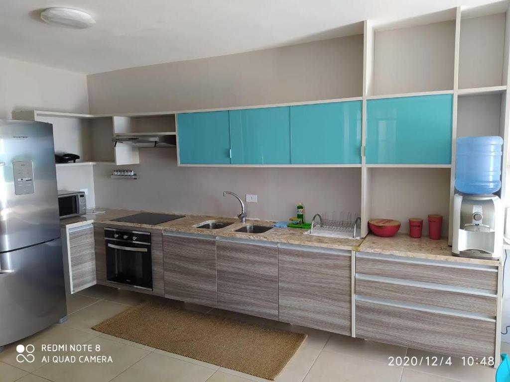 Küche/Küchenzeile in der Unterkunft Apart Hotel As Vieiras