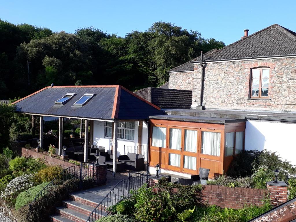 a house with a solarium on top of it at The Liscawn in Torpoint