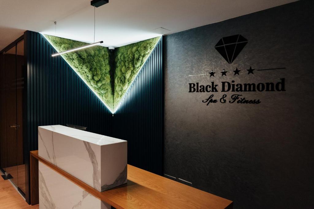 Certifikát, hodnocení, plakát nebo jiný dokument vystavený v ubytování Black Diamond Hotel