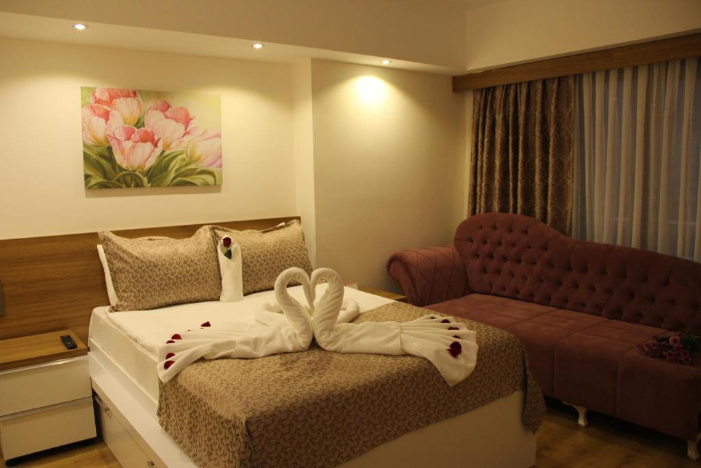 Кровать или кровати в номере Devin Otel