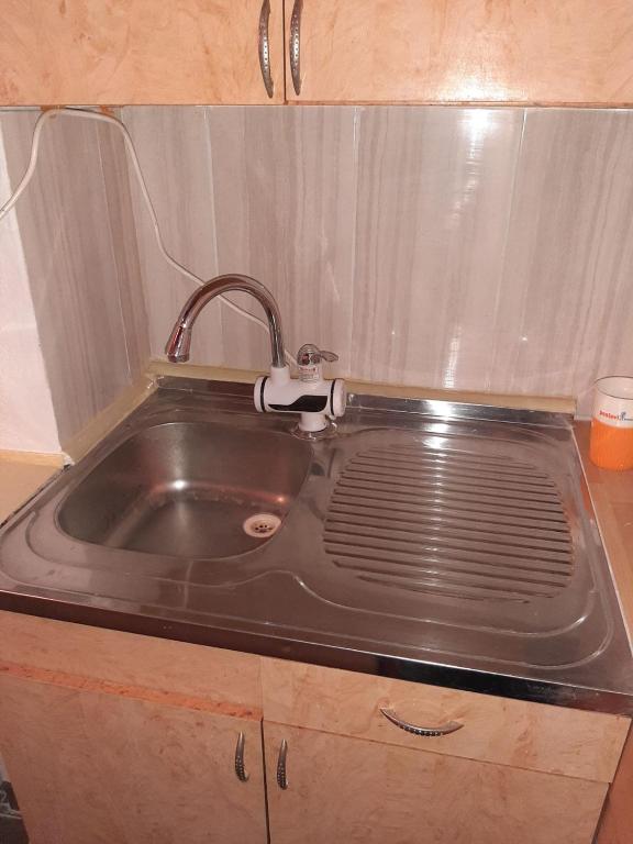 Kuchyň nebo kuchyňský kout v ubytování KRIN apartman