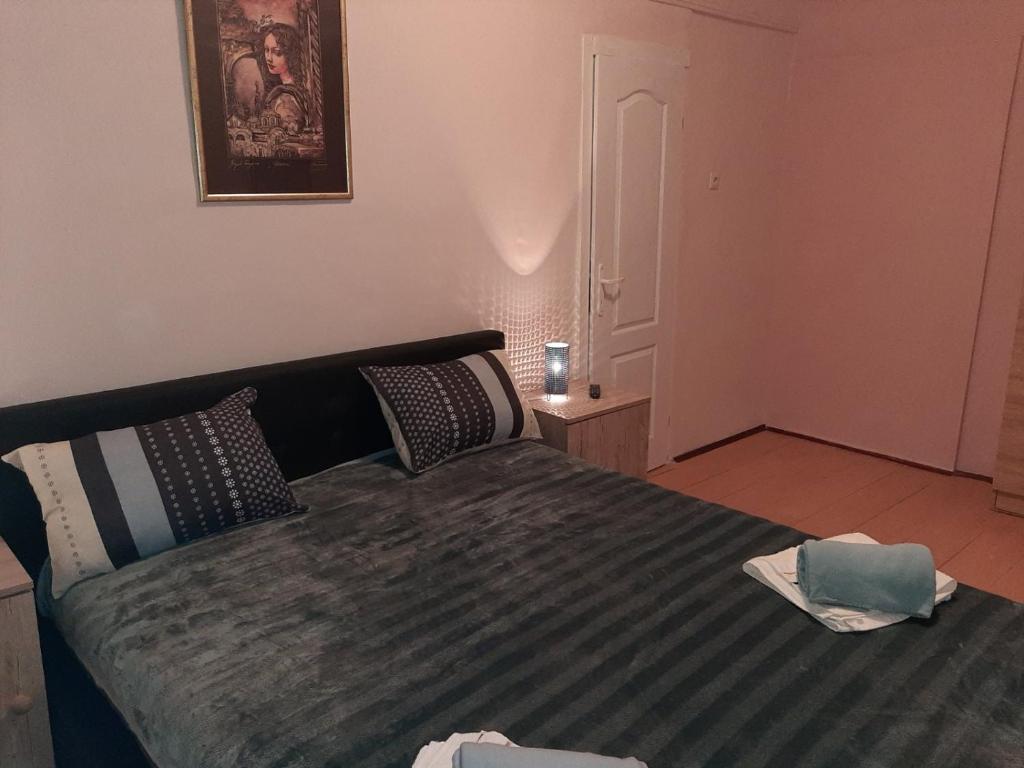 Postel nebo postele na pokoji v ubytování KRIN apartman