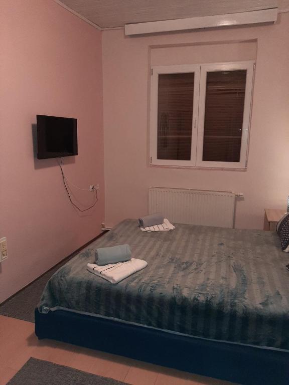Postel nebo postele na pokoji v ubytování KRIN apartman