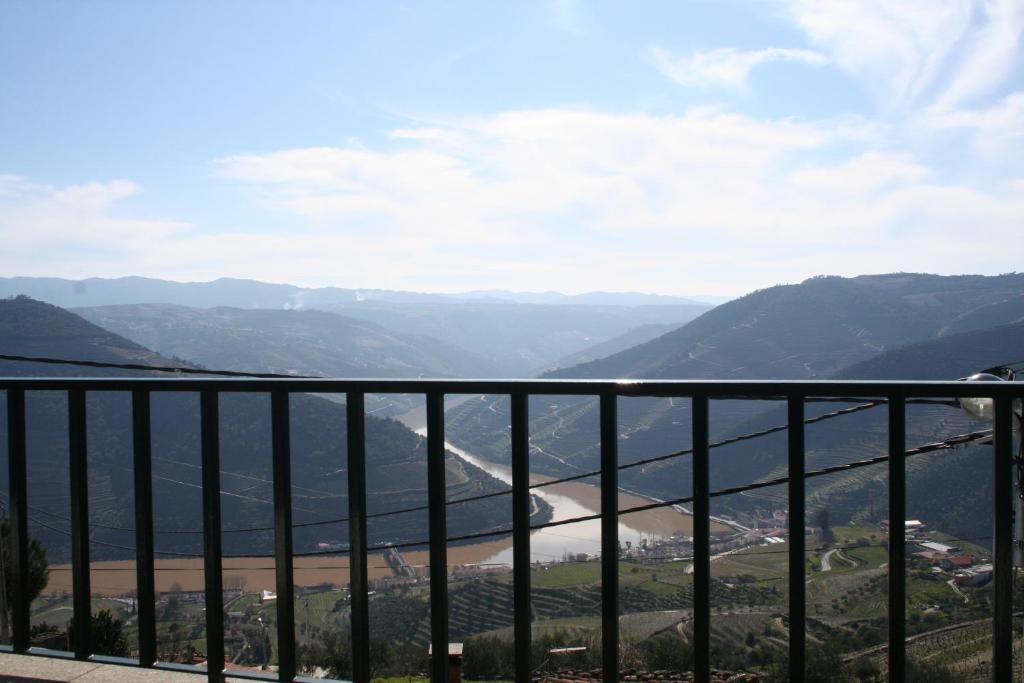 a view of a valley from a balcony at Casa da Bela Vista in Casal de Loivos