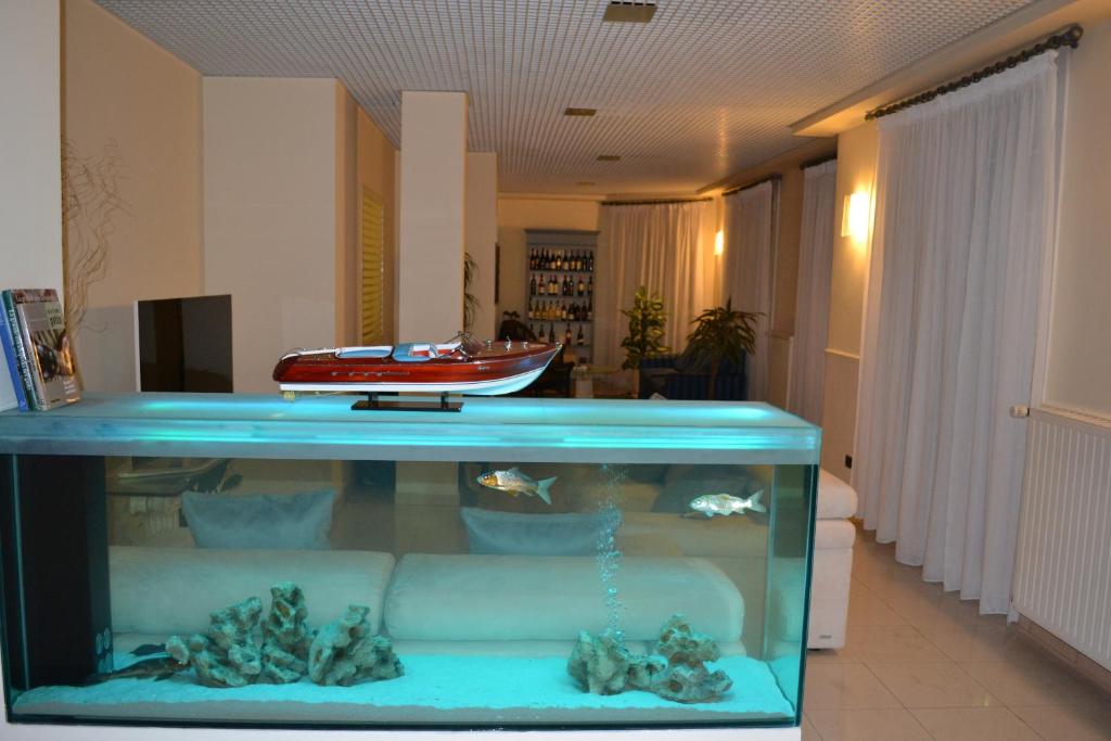 Kuchyň nebo kuchyňský kout v ubytování Hotel Il Gatto