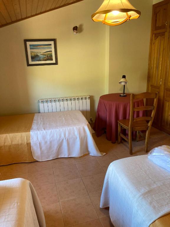Postel nebo postele na pokoji v ubytování Casa Encuentra, en el Pirineo al lado de Ainsa