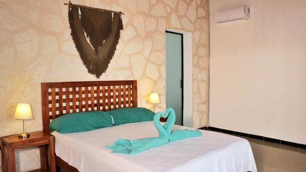 Postel nebo postele na pokoji v ubytování Hotel Itza Coba