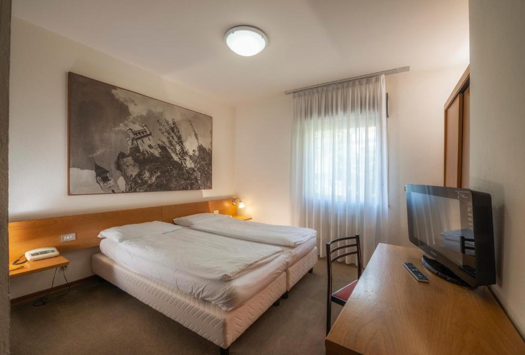 Postel nebo postele na pokoji v ubytování Hotel Rendez Vous