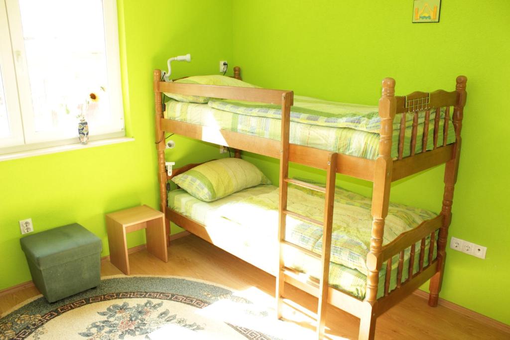 Postel nebo postele na pokoji v ubytování Majdas