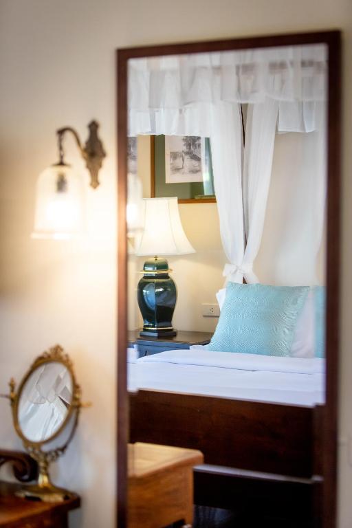 Postel nebo postele na pokoji v ubytování Punyashthiti villa