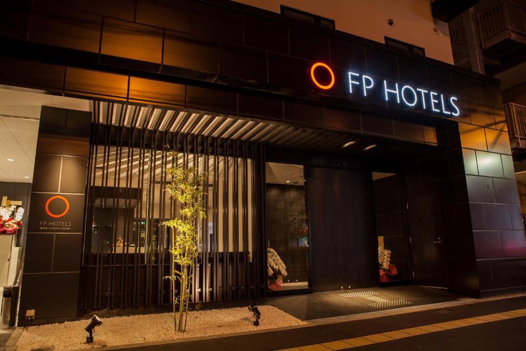 a store front of a hotel at night at FP HOTELS South-Namba in Osaka