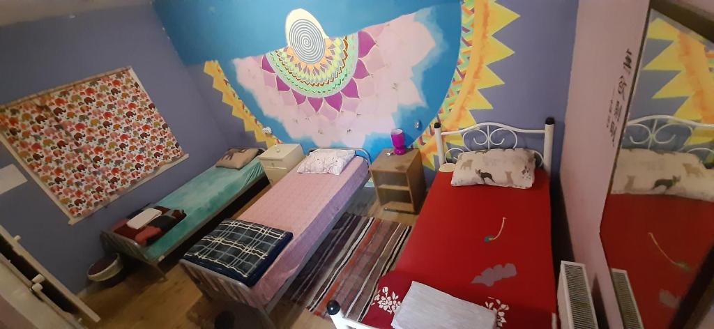 Postel nebo postele na pokoji v ubytování Shantihome