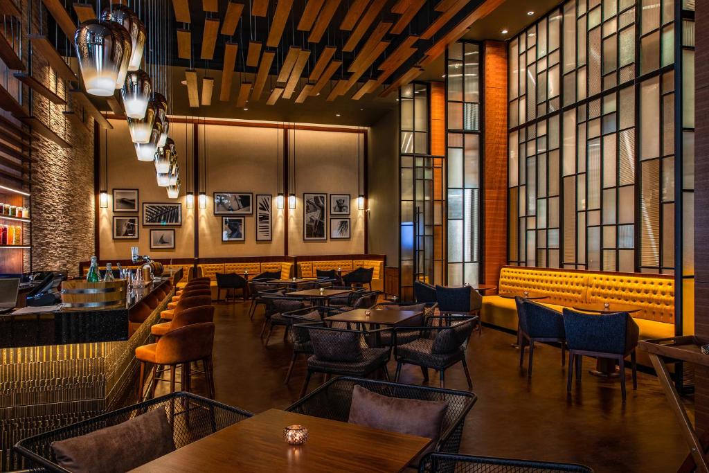 Al Jaddaf Rotana Suite Hotel - Resim 38