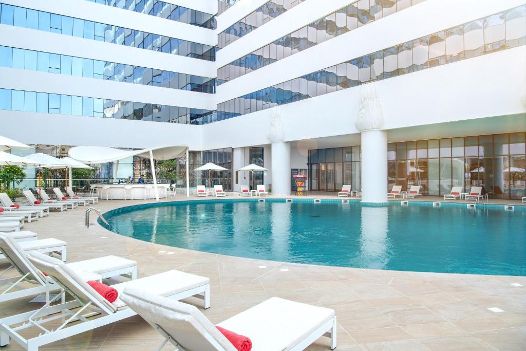 Al Jaddaf Rotana Suite Hotel - Resim 44