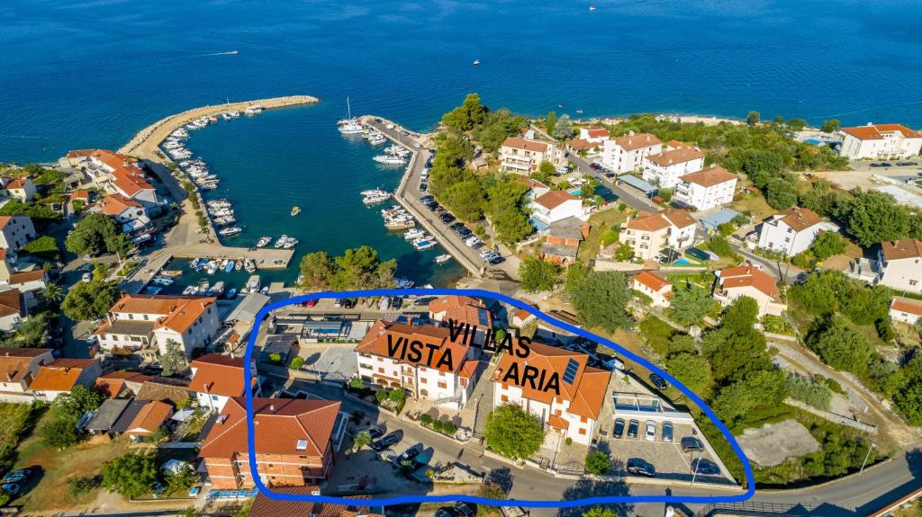 an aerial view of a town next to the water at Villa Vista in Malinska