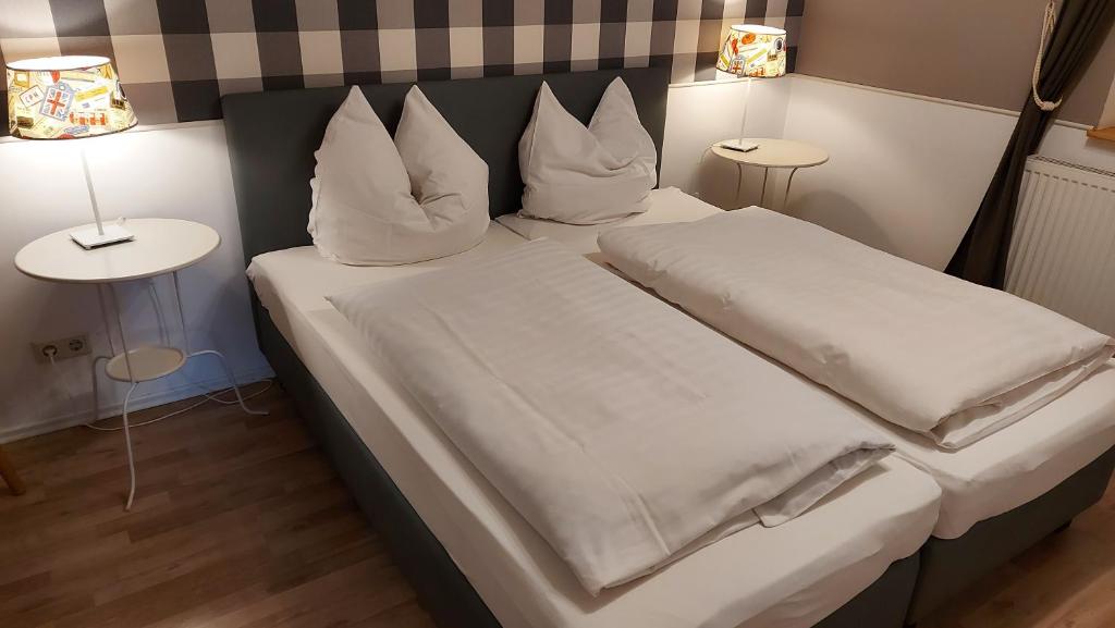 Llit o llits en una habitació de Fachwerkhaus Hartmann