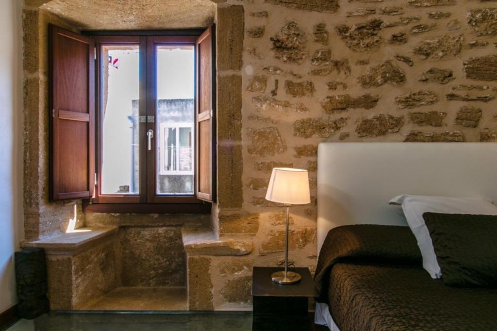 Posezení v ubytování Casa Murallas para 6 con piscina en Alcudia cerca de playas