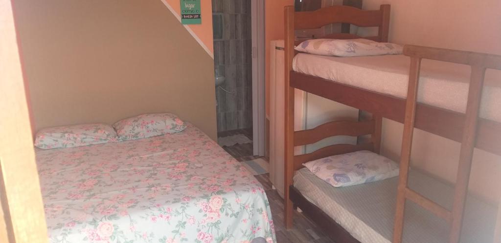 Postel nebo postele na pokoji v ubytování Pousada Aconchego