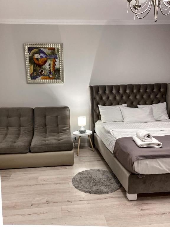 Letto o letti in una camera di Opera Center Hotel & Apartments
