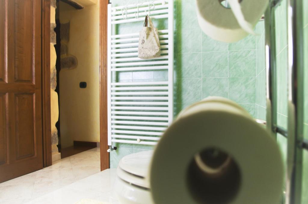 Fotografie z fotogalerie ubytování Casa De Ajala - B&B de Charme in Antica Dimora totalmente ristrutturata e dotata di tutti i confort Bagni privati Spazio living Patio esterno Ambienti climatizzati Degustazioni prodotti locali v destinaci Làconi