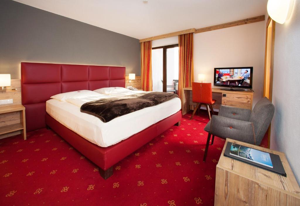 Postel nebo postele na pokoji v ubytování Hotel Bruno