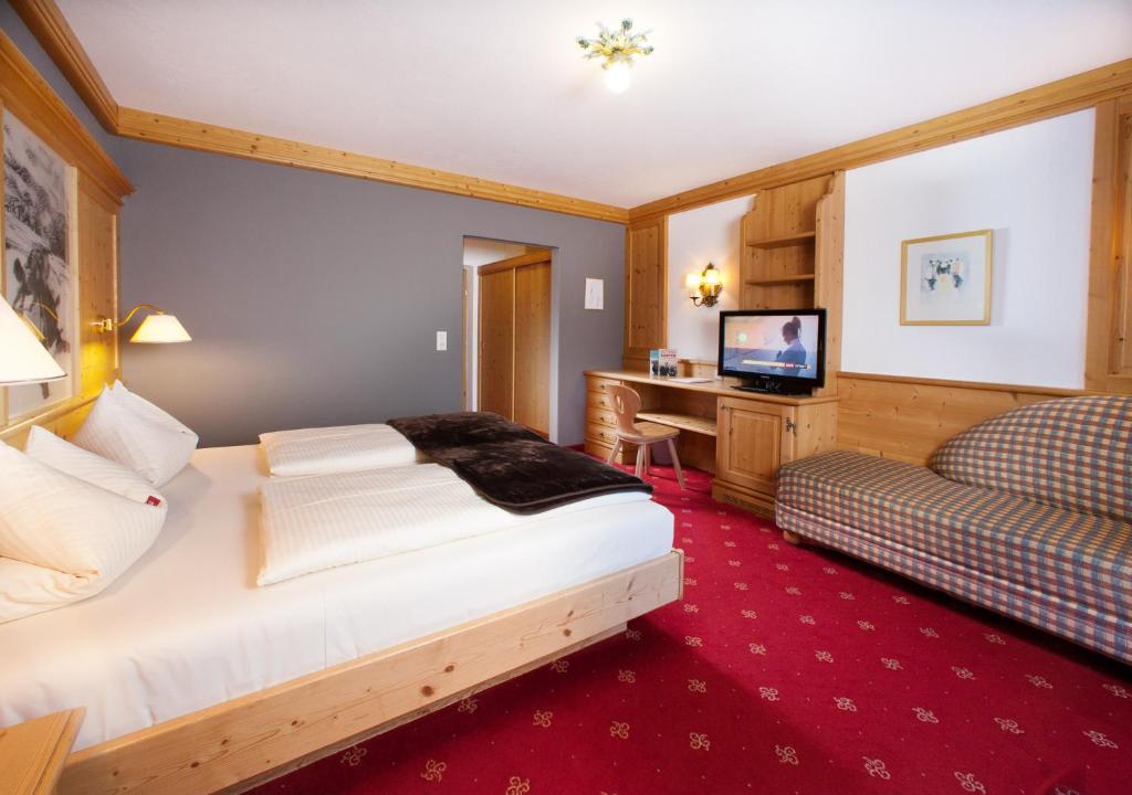 Postel nebo postele na pokoji v ubytování Hotel Bruno