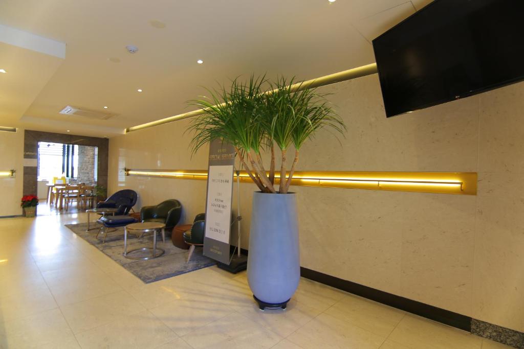 TV a/nebo společenská místnost v ubytování Suncheon Hotel Gite