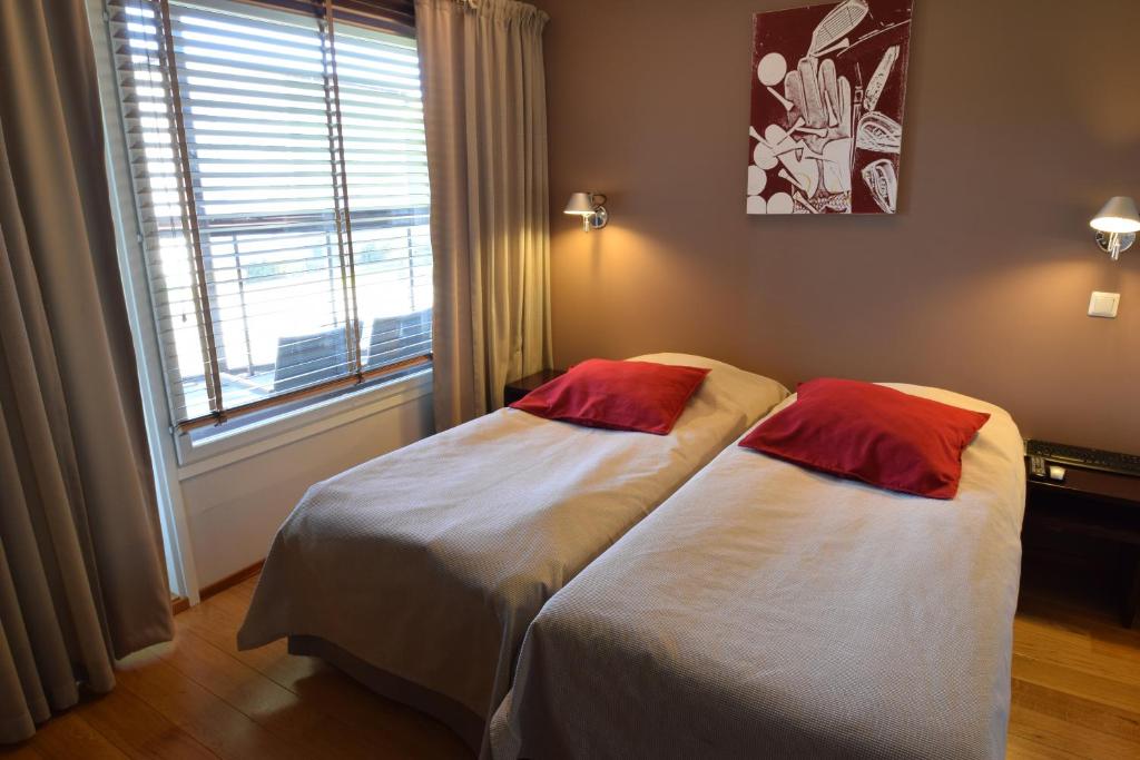 Кровать или кровати в номере Holiday Club Tahko Spa Apartments