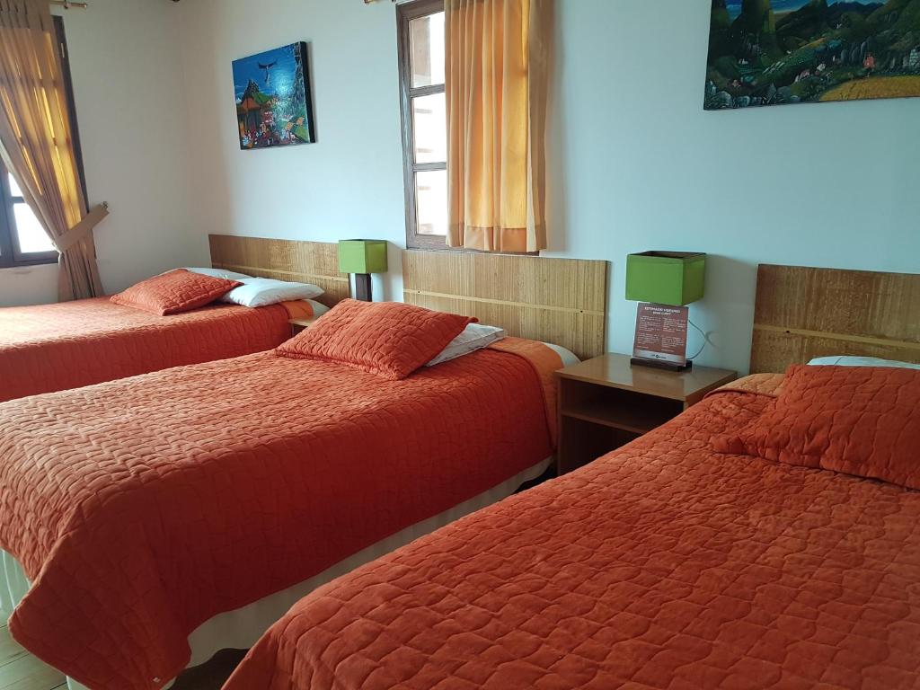 Postel nebo postele na pokoji v ubytování Hotel PrincesaToa