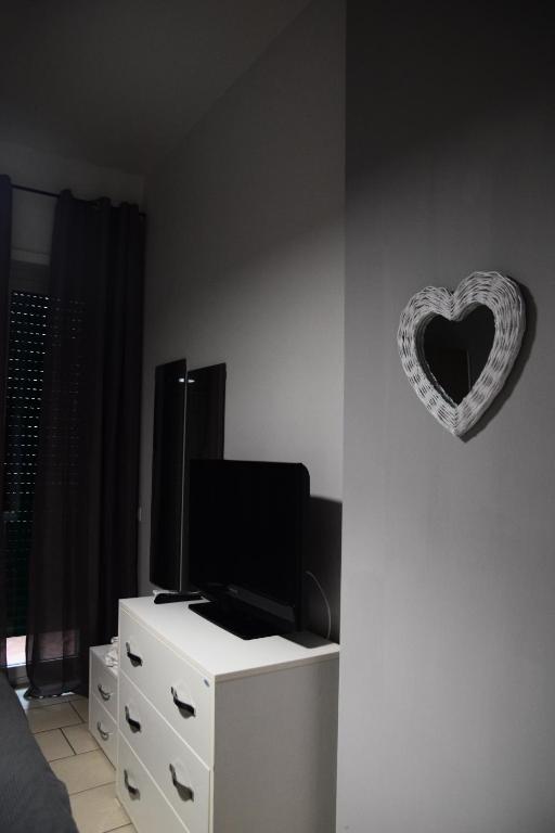 Telewizja i/lub zestaw kina domowego w obiekcie De Gasperi House