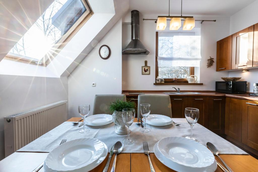Kuchyňa alebo kuchynka v ubytovaní TatryTOP Apartamenty Kaszelewski