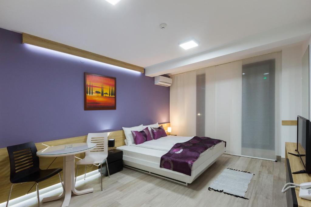 Postel nebo postele na pokoji v ubytování B&B Nataly 2