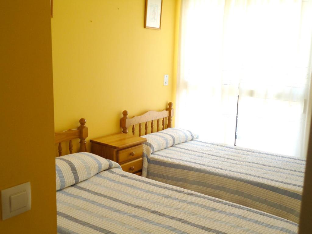Posteľ alebo postele v izbe v ubytovaní Charming Apartment in Dénia with Shared Pool