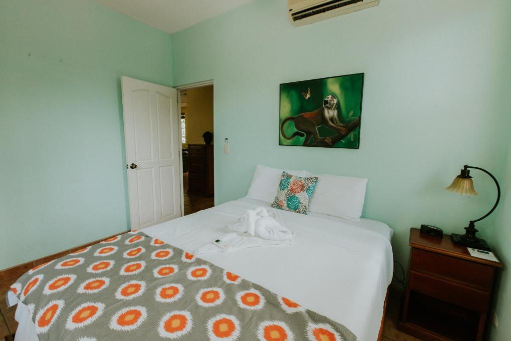Postel nebo postele na pokoji v ubytování La Posada Jungle Hotel