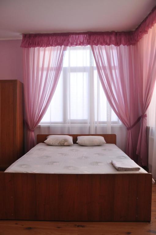Postel nebo postele na pokoji v ubytování Мотель Карман