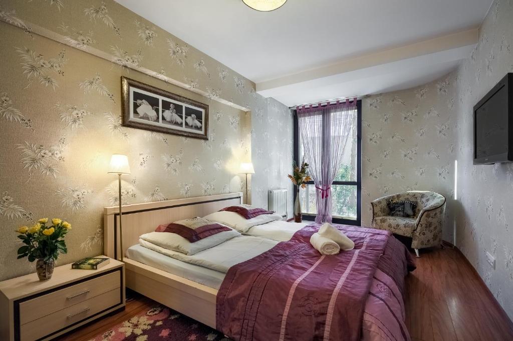 Ein Bett oder Betten in einem Zimmer der Unterkunft Apartament nad Kryniczanką