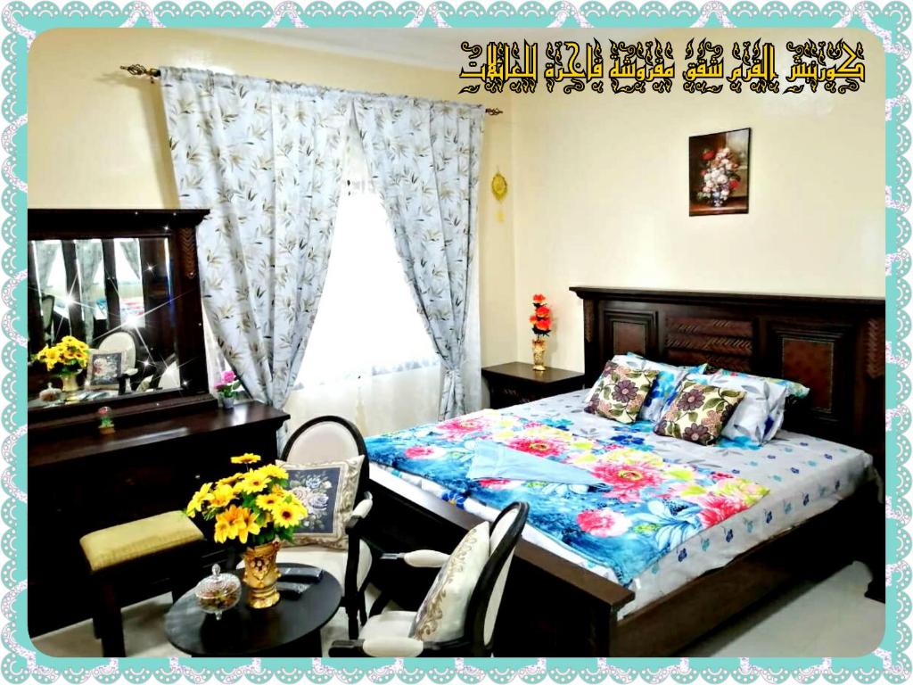 Säng eller sängar i ett rum på Mangrove Corniche Families Luxury Furniture Apartments
